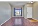 Inviting living room with hardwood floors, neutral paint, and ample natural light at 10732 Cook Ct, Northglenn, CO 80233