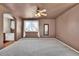 The spacious main bedroom has carpet and a window at 10732 Cook Ct, Northglenn, CO 80233