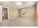 Well-lit secondary bedroom with neutral color scheme at 8482 Parkland St, Broomfield, CO 80021