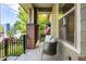 Inviting front porch with seating area, perfect for relaxing outdoors at 8482 Parkland St, Broomfield, CO 80021