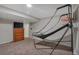 Finished basement showcasing indoor basketball, carpet flooring, and recreational opportunities at 5149 S Tibet St, Aurora, CO 80015