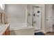 Main bath features a soaking tub, shower and lots of space to relax at 5149 S Tibet St, Aurora, CO 80015
