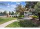 Clubhouse view with well-maintained lawn and landscape at 7942 S Vincennes Way, Centennial, CO 80112