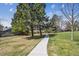 Scenic walking path with shade trees, perfect for an evening stroll or walk at 7942 S Vincennes Way, Centennial, CO 80112