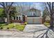 Charming two-story home with a two-car garage and well-maintained front lawn at 7942 S Vincennes Way, Centennial, CO 80112