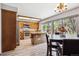 Eat-in kitchen featuring wood cabinets, stainless steel appliances, and light, bright flooring at 7942 S Vincennes Way, Centennial, CO 80112