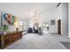 Bright, spacious room with vaulted ceilings, ample light, and versatile setup at 7942 S Vincennes Way, Centennial, CO 80112