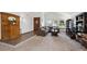 Bright living room featuring a comfortable couch, large windows, and stylish decor at 7942 S Vincennes Way, Centennial, CO 80112