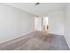 Bedroom features neutral carpeting and access to additional bedrooms and the bathroom at 10950 W Florida Ave # 314, Lakewood, CO 80232