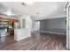 Open concept kitchen and living area with hardwood floors at 10950 W Florida Ave # 314, Lakewood, CO 80232