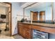 Bathroom vanity with granite countertop, wood cabinets and modern faucets at 3312 S Ouray Way, Aurora, CO 80013