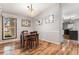 Inviting dining room with hardwood floors and natural lighting at 3312 S Ouray Way, Aurora, CO 80013