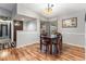 Cozy dining room features hardwood floors, natural light and an adjacent breakfast nook at 3312 S Ouray Way, Aurora, CO 80013