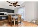 Dining area with hardwood floors, a ceiling fan, and plenty of natural light at 3312 S Ouray Way, Aurora, CO 80013