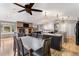 Open kitchen and dining area, seamlessly connected with a cozy living room at 3312 S Ouray Way, Aurora, CO 80013