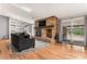 Comfortable living room with fireplace, hardwood floors, and natural light at 3312 S Ouray Way, Aurora, CO 80013
