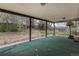 Covered patio area with a fenced in yard, garden, and a basketball hoop on the property at 3312 S Ouray Way, Aurora, CO 80013