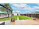 Backyard features a well-maintained lawn and a shed at 3155 N Steele St, Denver, CO 80205