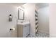 Bright bathroom featuring a sleek vanity and shower with modern fixtures at 3155 N Steele St, Denver, CO 80205