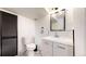 Charming bathroom showcasing a modern vanity and stylish tile flooring at 3155 N Steele St, Denver, CO 80205