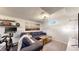 Relaxing living room with comfortable seating, a TV, and fitness equipment at 3155 N Steele St, Denver, CO 80205