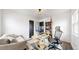 Bright, spacious office featuring a comfortable chair and a large desk at 3155 N Steele St, Denver, CO 80205