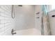 Clean white subway tiled shower with modern fixtures and ample space at 3155 N Steele St, Denver, CO 80205