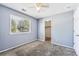 Charming bedroom with carpet, window, and closet at 20493 E Hampden Pl, Aurora, CO 80013