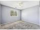 Spacious bedroom with carpet and large window at 20493 E Hampden Pl, Aurora, CO 80013