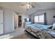 Spacious main bedroom showcasing a walk-in closet, modern decor, and a calming color scheme at 5431 E 129Th Ave, Thornton, CO 80241