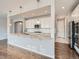 Spacious kitchen with granite countertops, stainless steel appliances, and modern pendant lighting at 10371 Harrisburg St, Parker, CO 80134