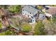 Aerial view of private backyard, mature trees, and outdoor patio space at 10234 W Geddes Cir, Littleton, CO 80127
