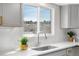 Kitchen sink with gooseneck faucet and large window at 10234 W Geddes Cir, Littleton, CO 80127