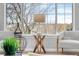 Living room corner with large window at 10234 W Geddes Cir, Littleton, CO 80127