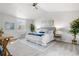 Large main bedroom features a large window, vaulted ceilings, and ample space at 10234 W Geddes Cir, Littleton, CO 80127