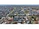 Wide aerial shot of a residential neighborhood, showcasing various architectural styles and tree-lined streets at 3636 Lipan St, Denver, CO 80211