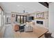 Comfortable living room with a fireplace, sliding glass doors to the backyard, and hardwood floors at 3636 Lipan St, Denver, CO 80211