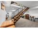 Open staircase with metal railings and a view of the lower level, enhancing the open living concept at 3636 Lipan St, Denver, CO 80211