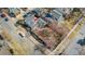 Overhead view shows the house's position on a treed corner lot at 1900 S Gilpin St, Denver, CO 80210