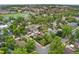 Aerial view of neighborhood, with mature trees, surrounding buildings, and a sense of community at 1900 S Gilpin St, Denver, CO 80210