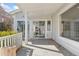 Back deck has access to the house through glass sliding doors and view of the backyard at 1900 S Gilpin St, Denver, CO 80210
