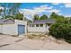 View of the detached garage and backyard at 1900 S Gilpin St, Denver, CO 80210