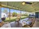 Outdoor patio featuring comfortable seating, a dining set, and a beautifully landscaped yard at 1475 Lucille Ct, Northglenn, CO 80233