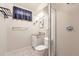 Clean bathroom features walk-in shower and modern fixtures at 1475 Lucille Ct, Northglenn, CO 80233