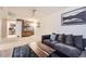 Inviting living room featuring plush seating, wood furniture, and decor at 1475 Lucille Ct, Northglenn, CO 80233