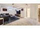 Inviting living room with plush seating, media center, and neutral tones at 1475 Lucille Ct, Northglenn, CO 80233