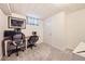 Functional home office with two desk areas and ample natural light at 1475 Lucille Ct, Northglenn, CO 80233