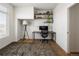 Dedicated home office space with sleek desk, shelving, and comfortable chair at 5880 W 39Th Pl, Wheat Ridge, CO 80212