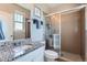 Bathroom with granite countertops and a glass shower at 5923 S Jamestown Ct, Aurora, CO 80016