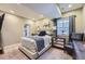 Cozy bedroom with a window, soft carpet, and a comfortable bed, creating a relaxing retreat at 5923 S Jamestown Ct, Aurora, CO 80016